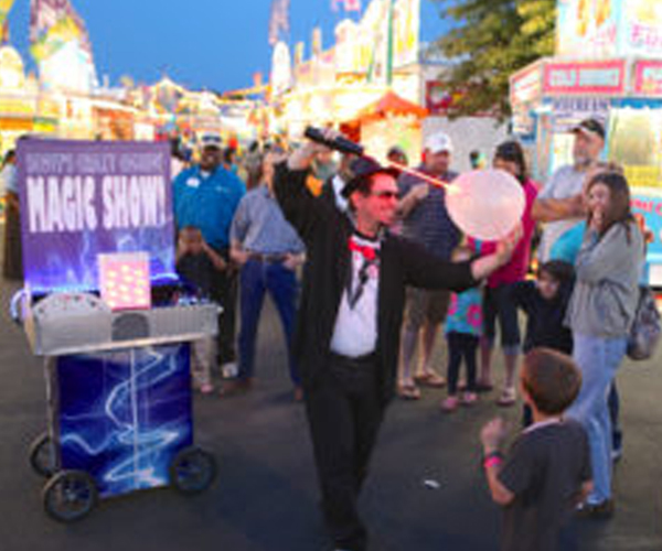 Scott's World Of Magic Performing On Midway